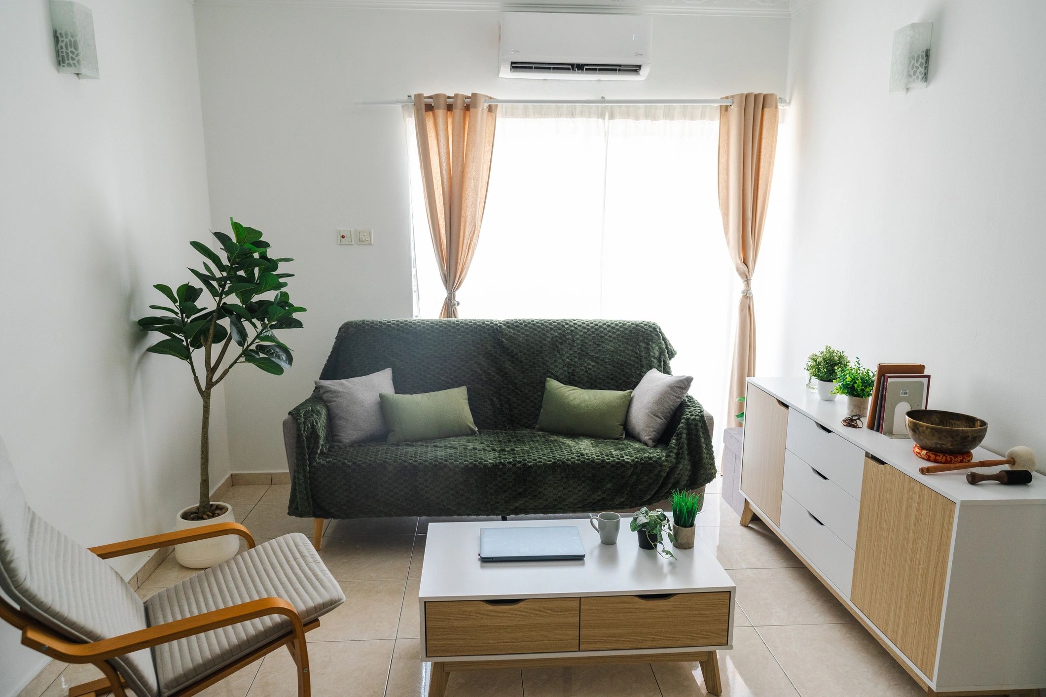 Living room with grey sofa and armchair