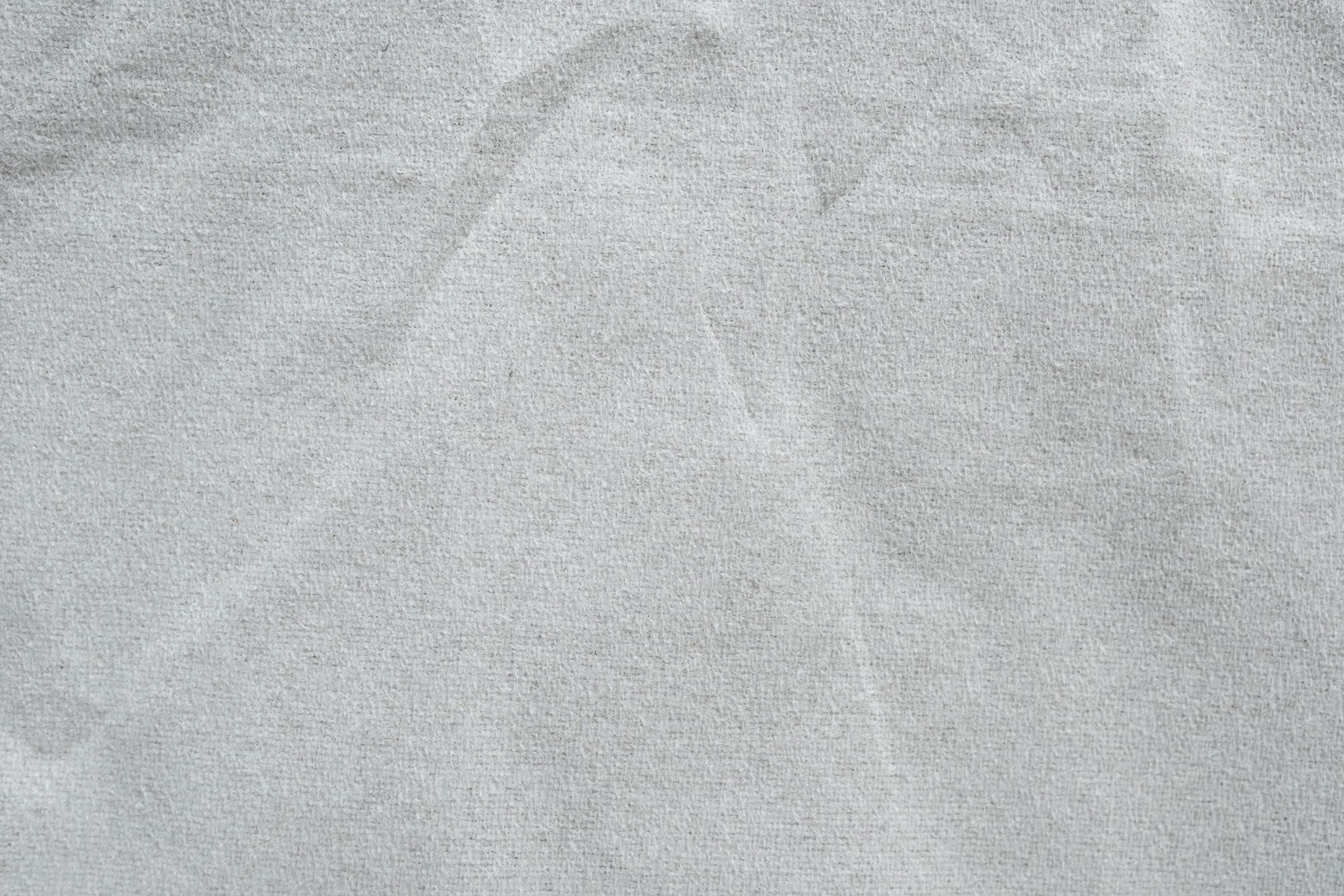 Close-up textured fabric sample in light gray